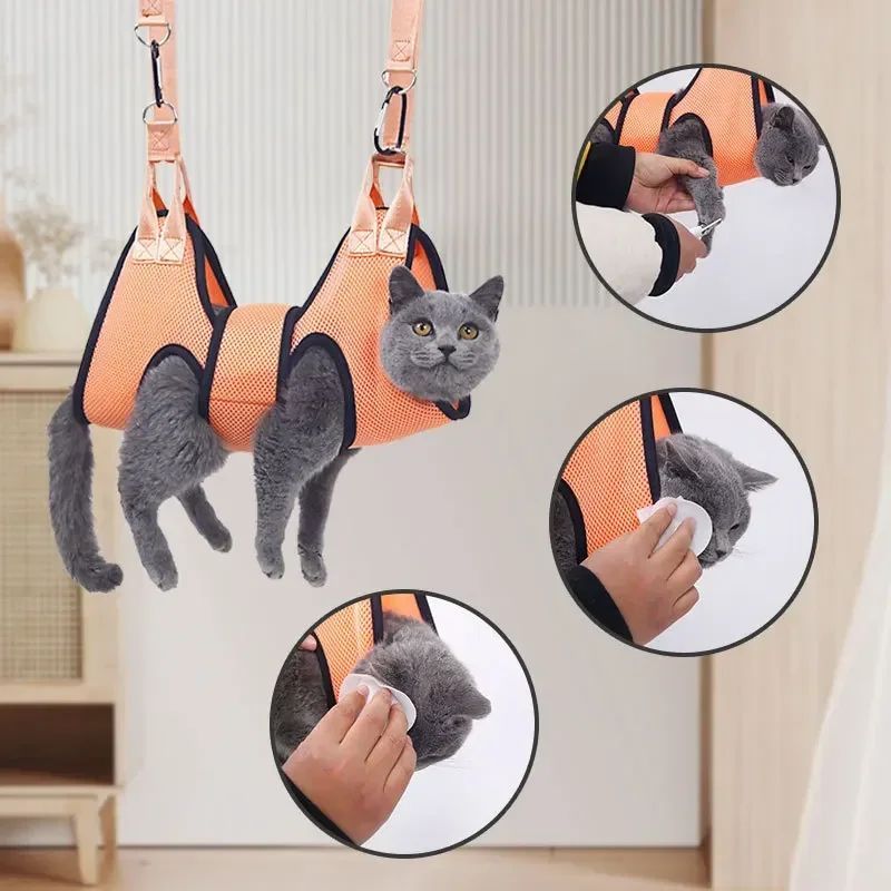 katt i en Hängande matta för nagelklippning